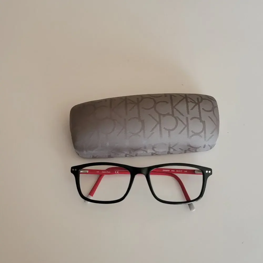 Calvin Klein CK59561 model featuring a black and red frame design 53X17X140